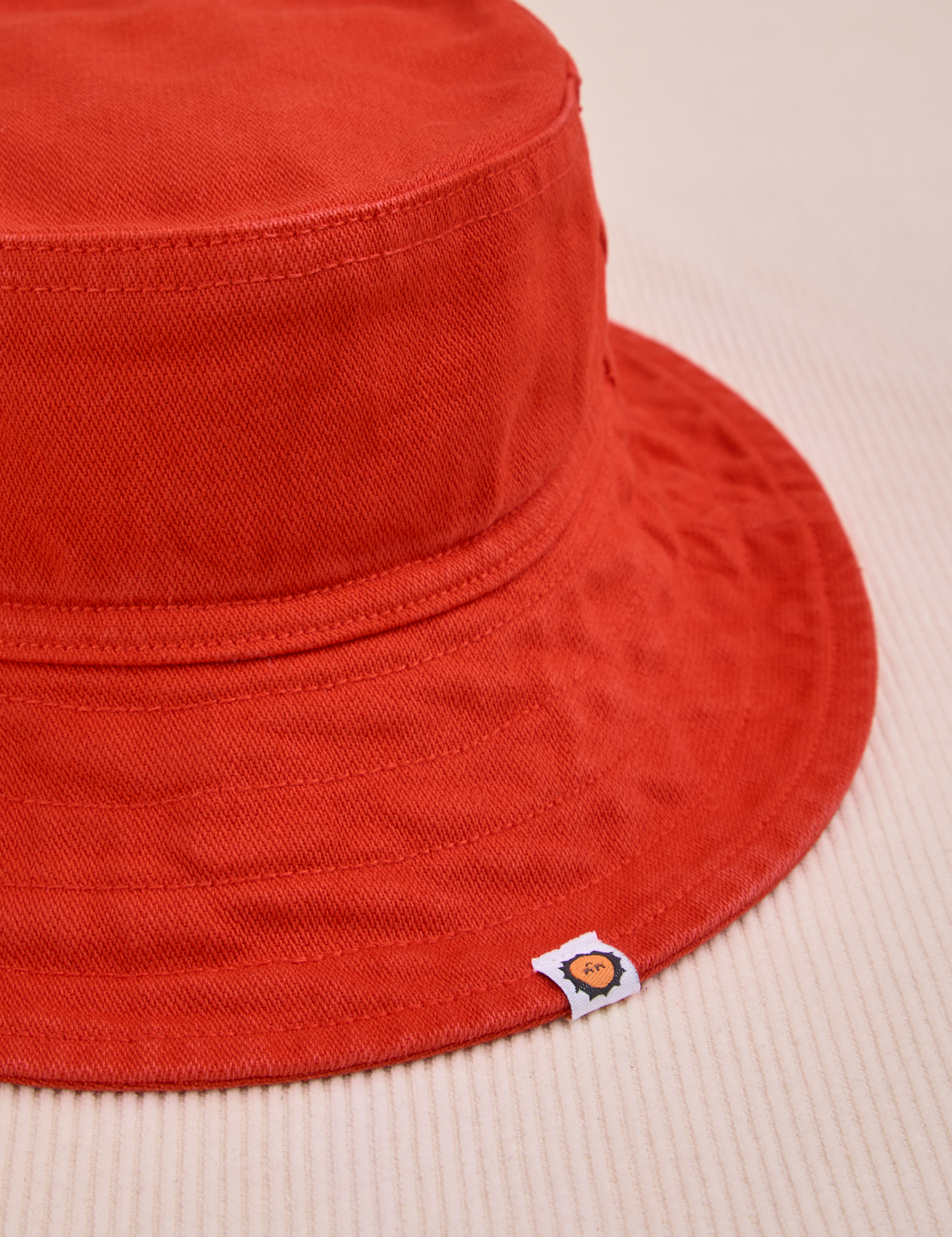 Wide Brim Denim Bucket Hats in Mustang Red close up