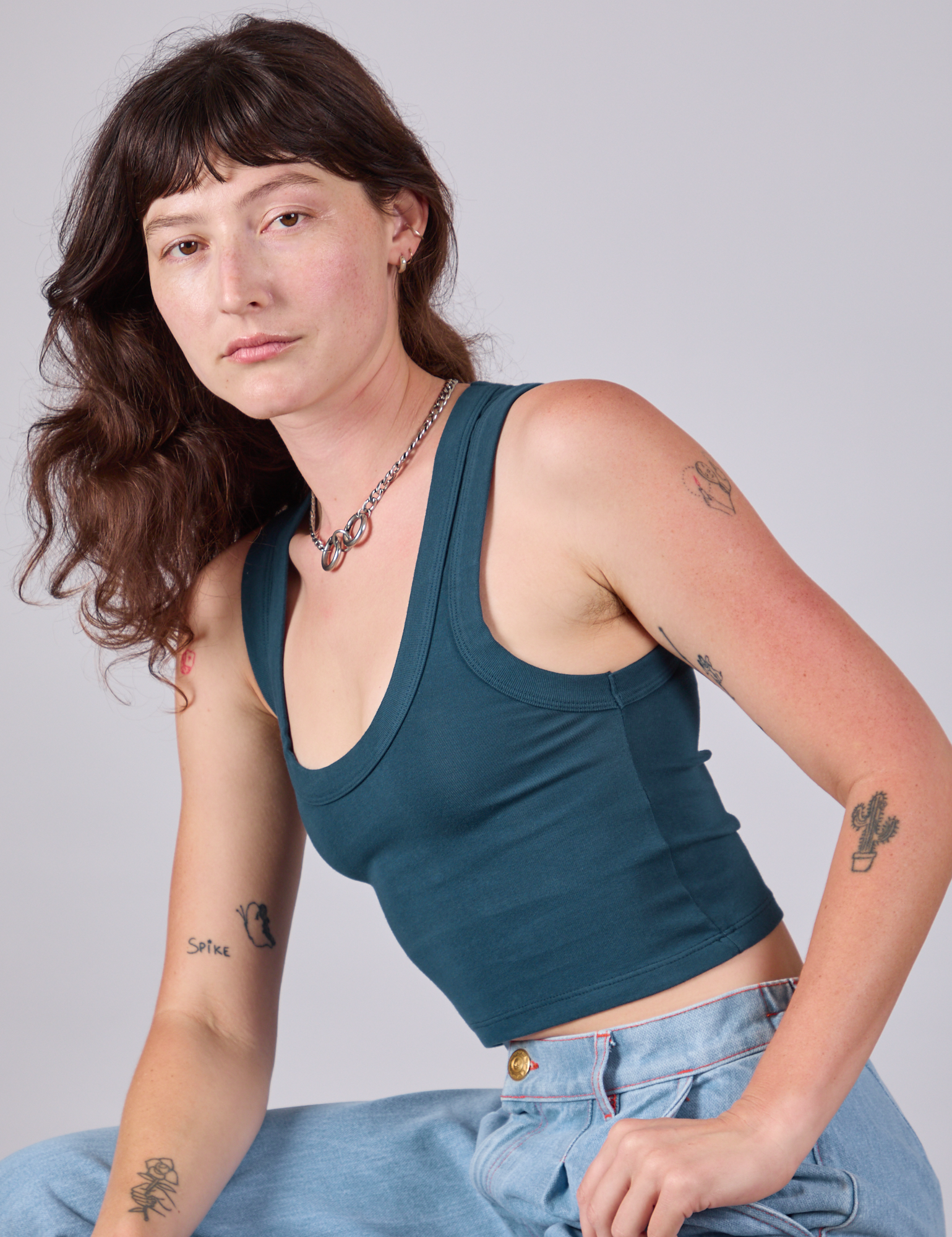 Cropped Tank Top in Lagoon side view on Alex