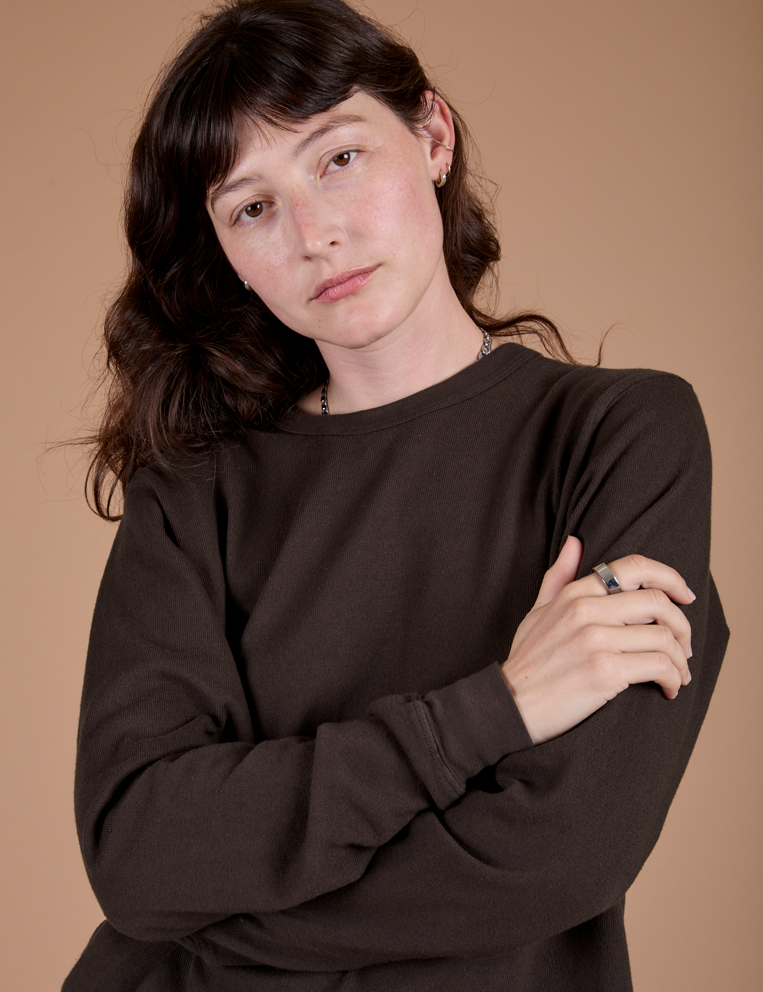Front close up of Long Sleeve Burly Tee in Espresso Brown on Alex