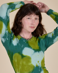 Long Sleeve Baby Tee in Green Magic Waters close up on Alex