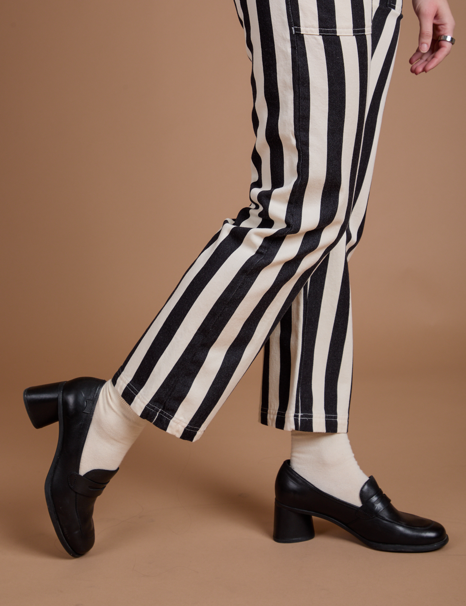 Black Stripe Work Pants in White pant leg close up on Alex