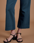 Action Pants in Lagoon pant leg close up on Alex