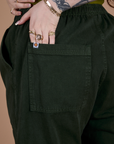 Action Pants in Swamp Green back pocket close up on Sydney