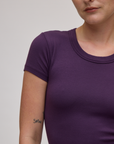 Front shoulder close up of Baby Tee in Nebula Purple on Alex