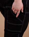 Close up of Carpenter Jeans in Black pant leg side pocket
