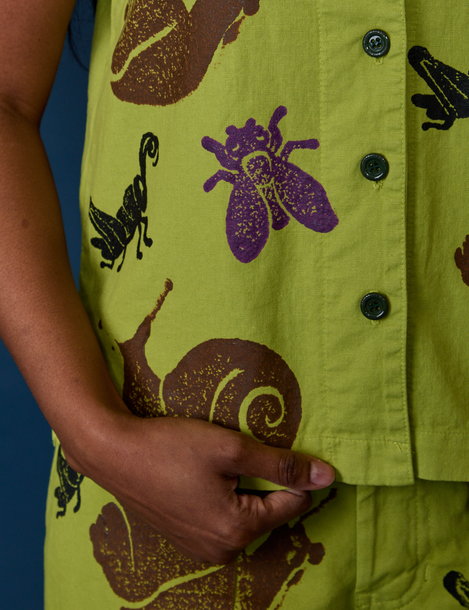 Close up of Paintstamped Pantry Button-Up in Big Bug on Kandia