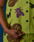 Close up of Paintstamped Pantry Button-Up in Big Bug on Kandia