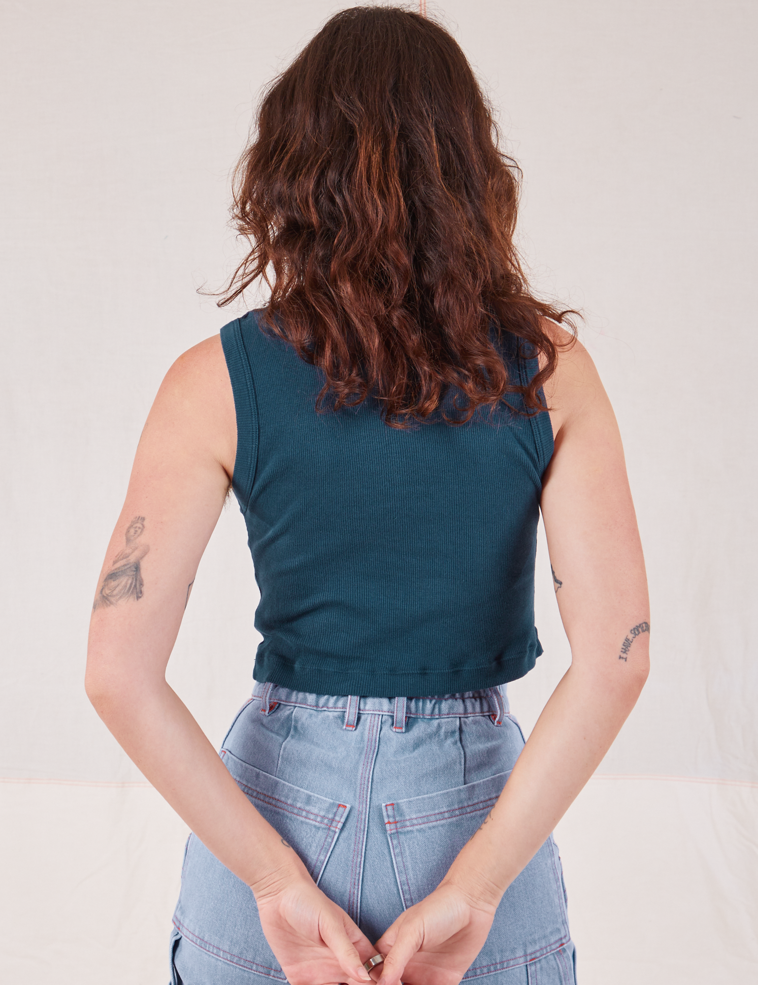 Muscle Tee in Lagoon back view on Alex