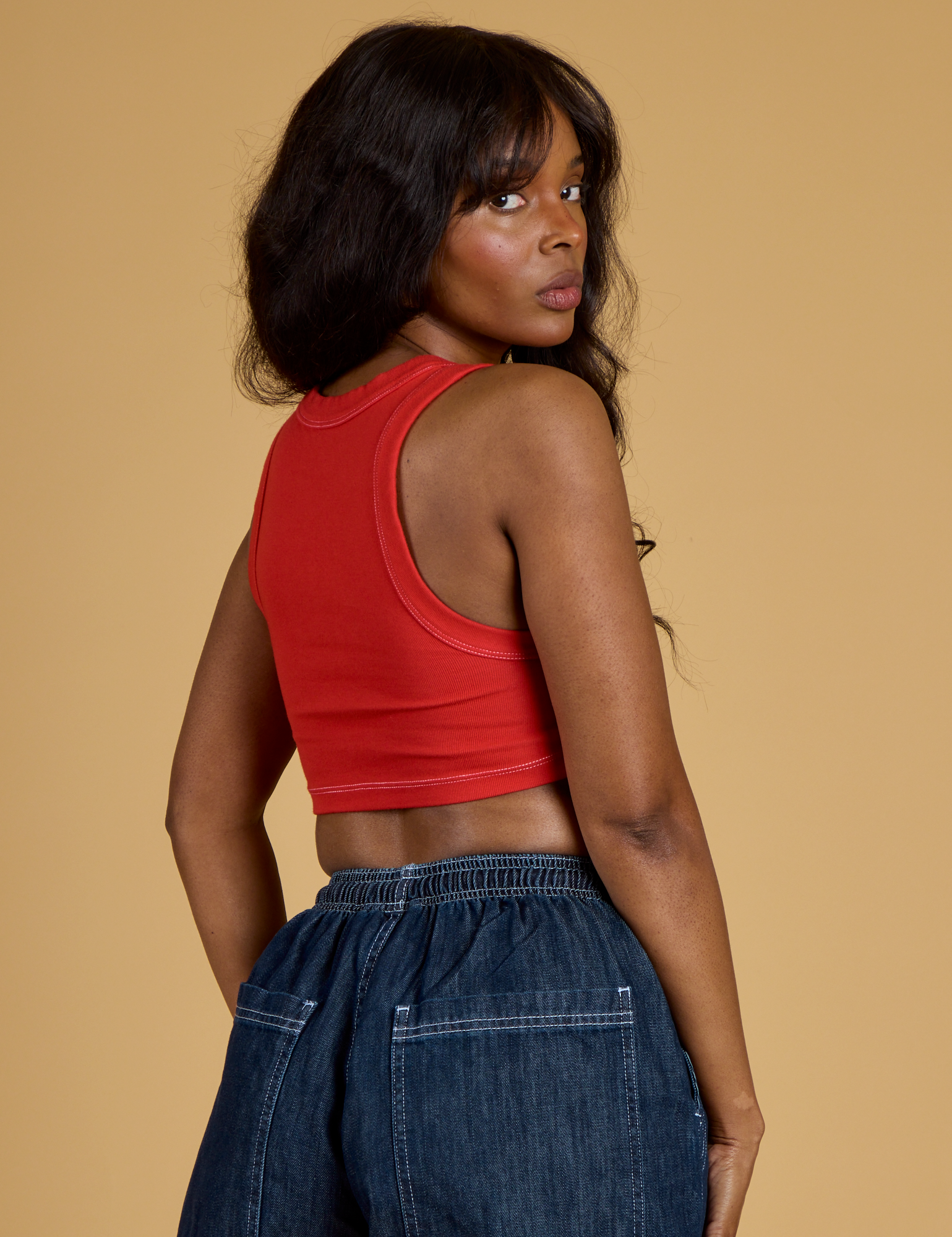 Contrast Stitch Mini Tank in Mustang Red angled back view on Kandia