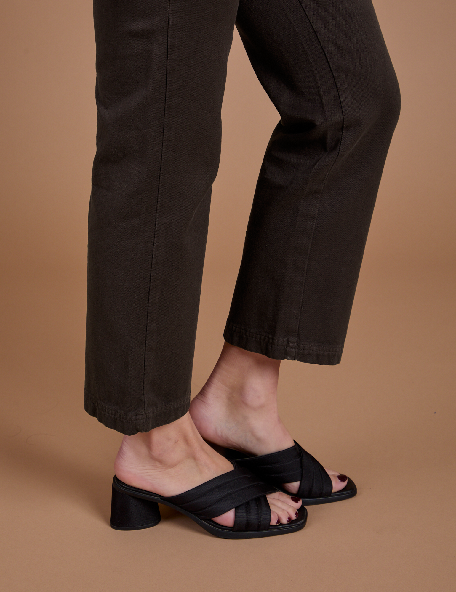 Side view Organic Work Pants in Espresso Brown pant leg close up on Alex