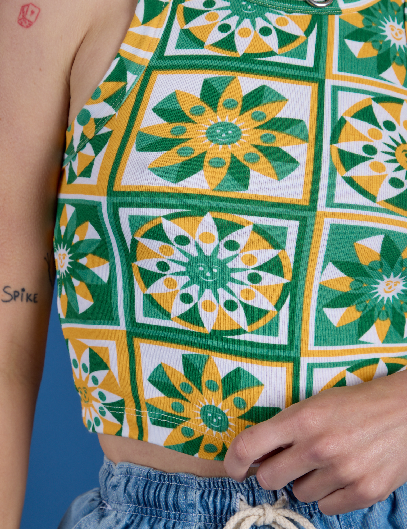 Deep-Cut Racerback Tank in Spring Quilt Print close up on Alex