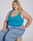Juliet is wearing Cropped Tank Top in Hawaiian Blue