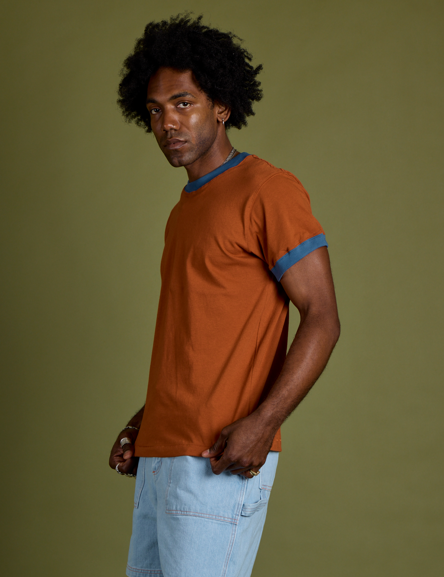 Side view of Vintage Ringer Tee in Burnt Terracotta on Jerrod