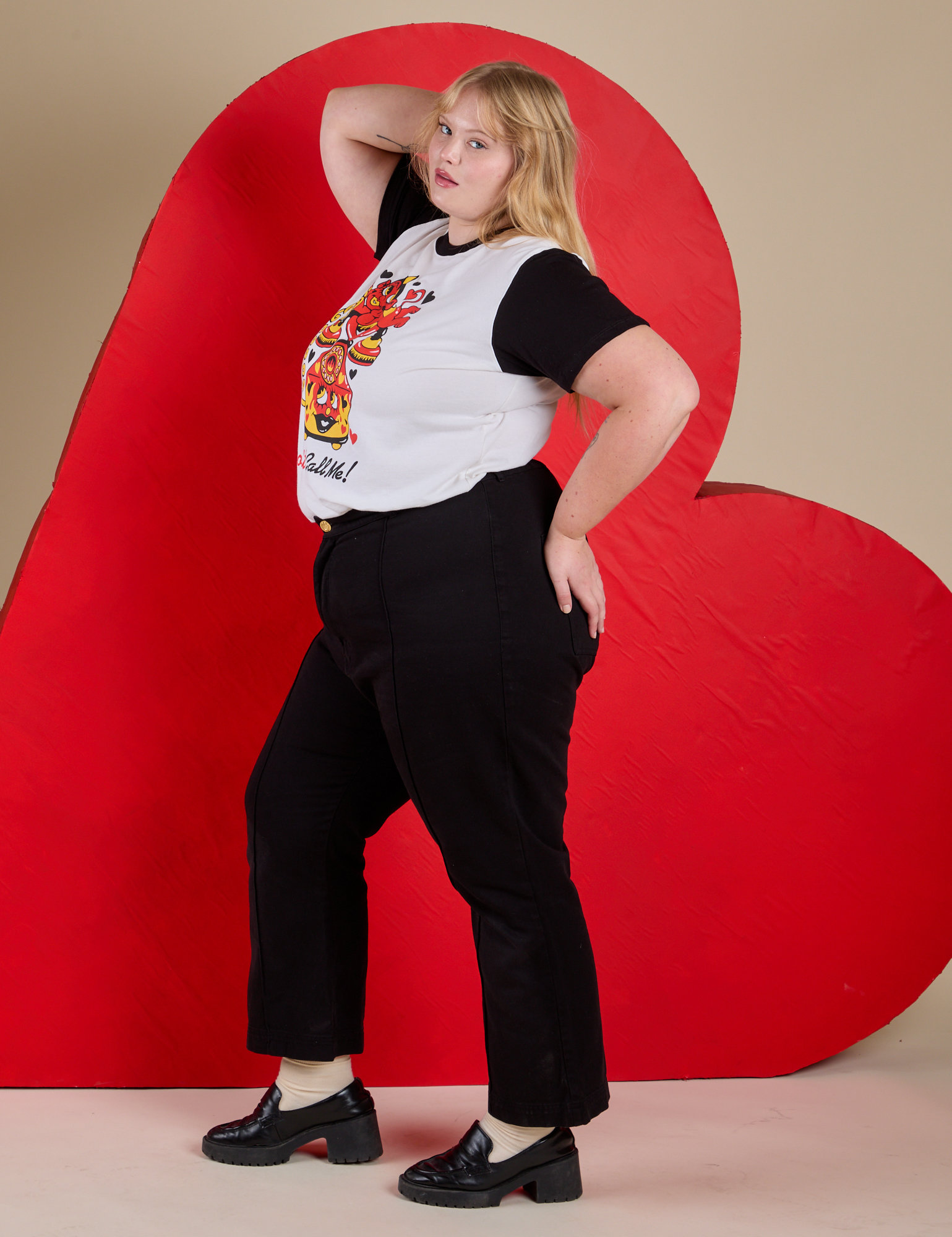 Side view of Vintage Tee in Don't Call Me and black Western Pants on Juliet