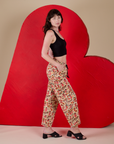 Hot Stuff Drop Pocket Cargo Pants and black Cropped Tank side view on Alex