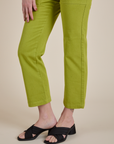 Work Pants in Gross Green pant leg close up on Alex