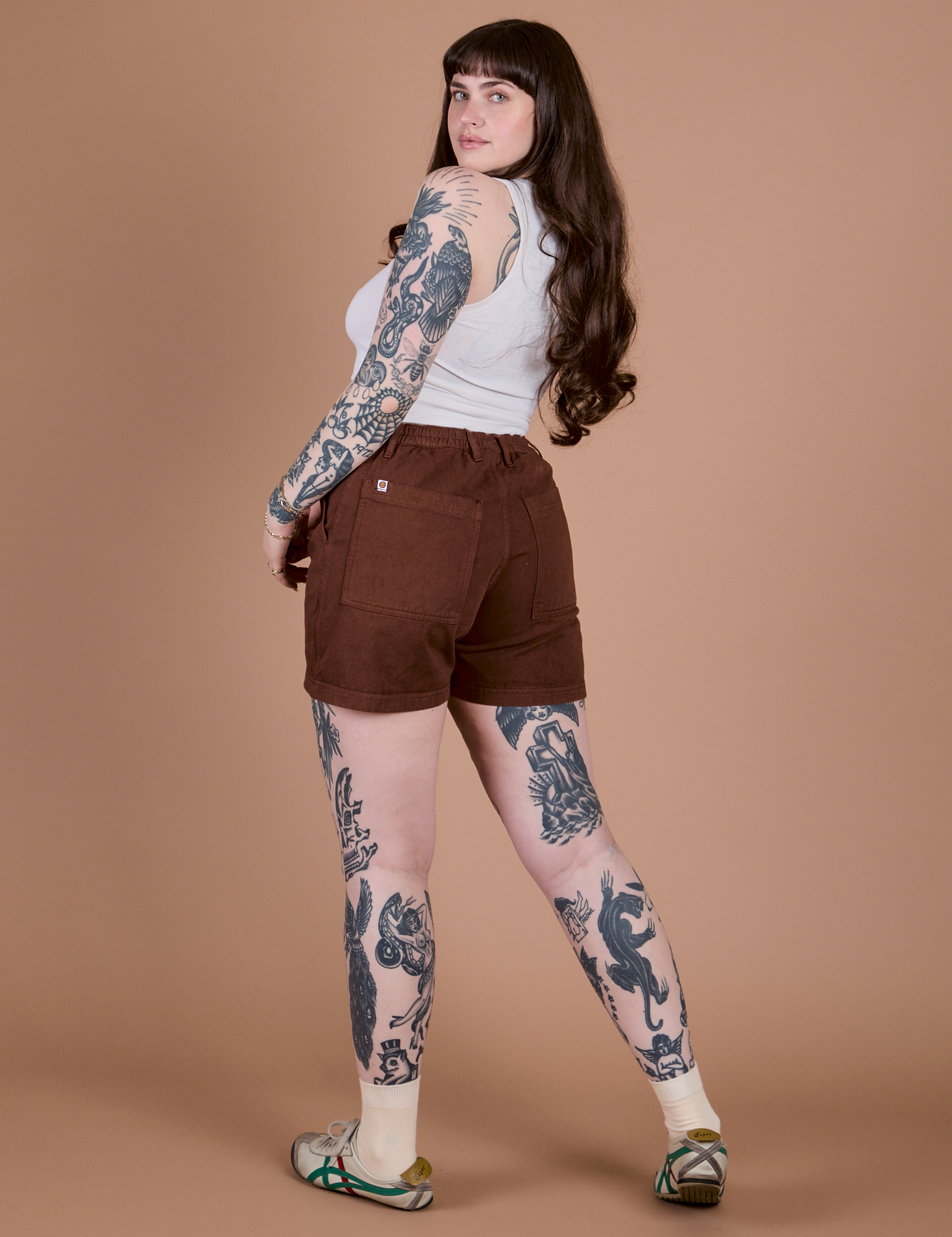 Angled back view of Classic Work Shorts in Fudgesicle Brown on Sydney