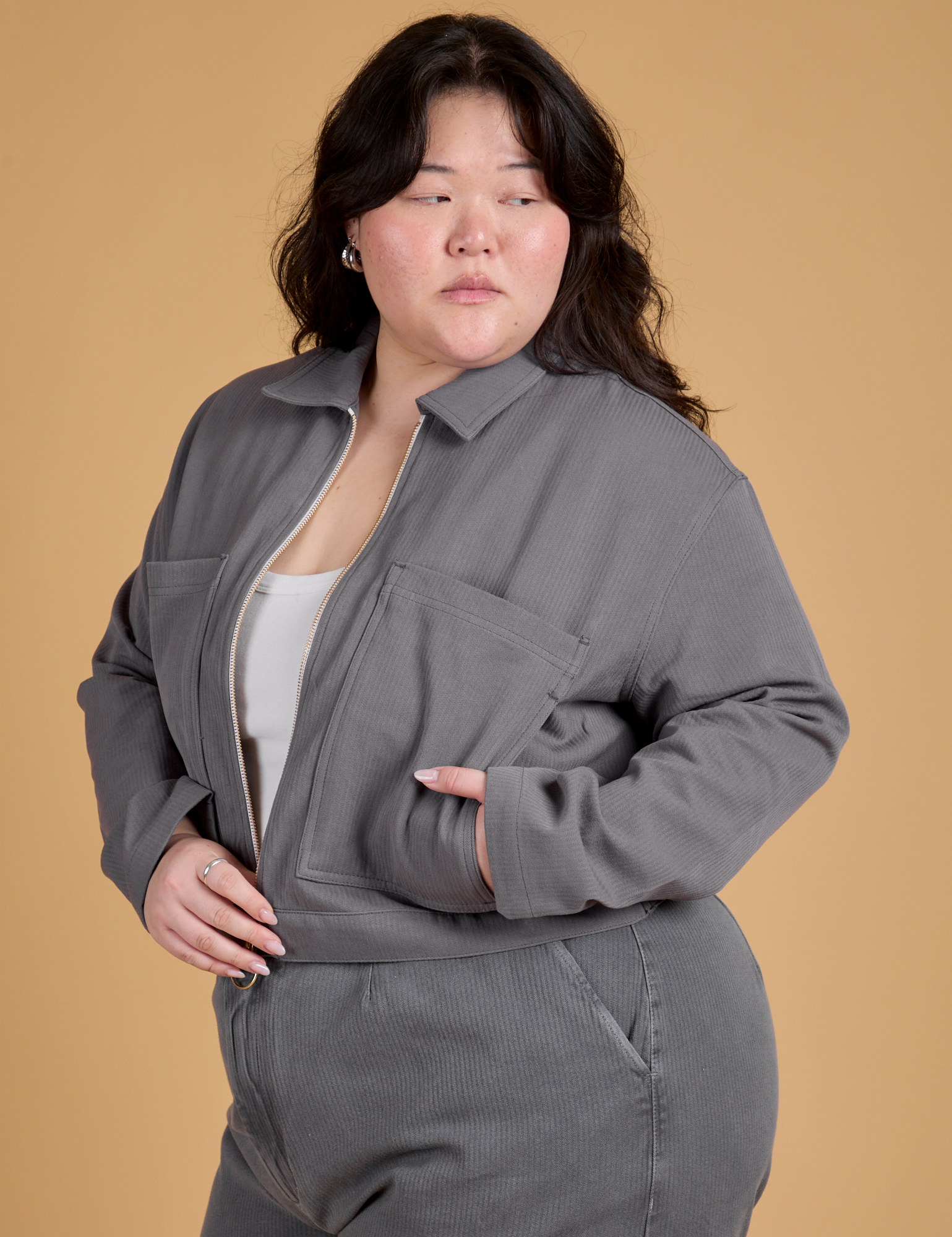 Angled front view of Heritage Mechanic Jacket in Washed Grey on Ashley