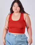 Ashley is 5'7" and wearing L Cropped Tank Top in Mustang Red