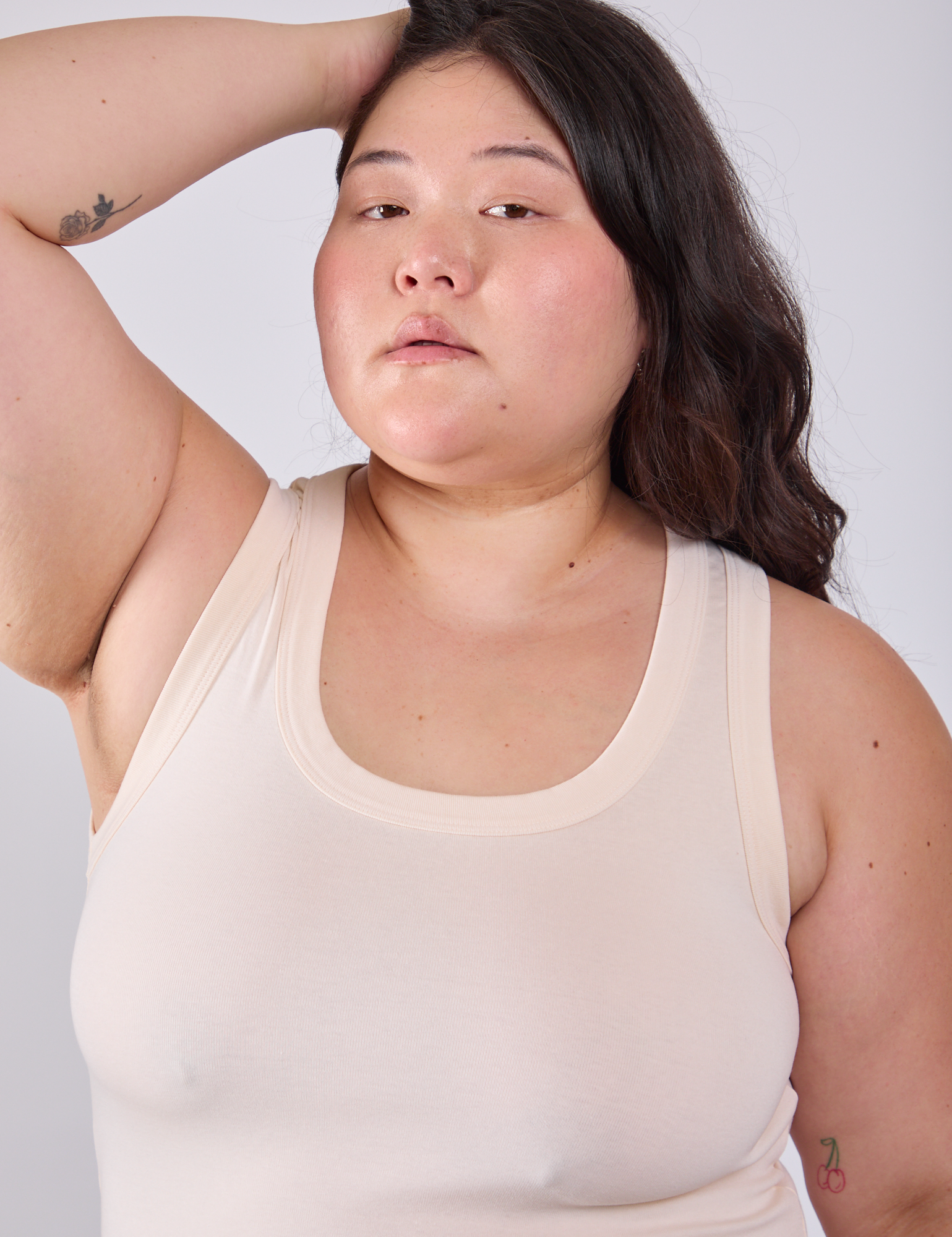 Tank Top in Vintage Tee Off-White close up on Ashley