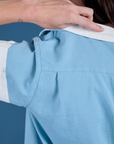 Painted Pantry Button-Up in Baby Blue back shoulder close up on Alex