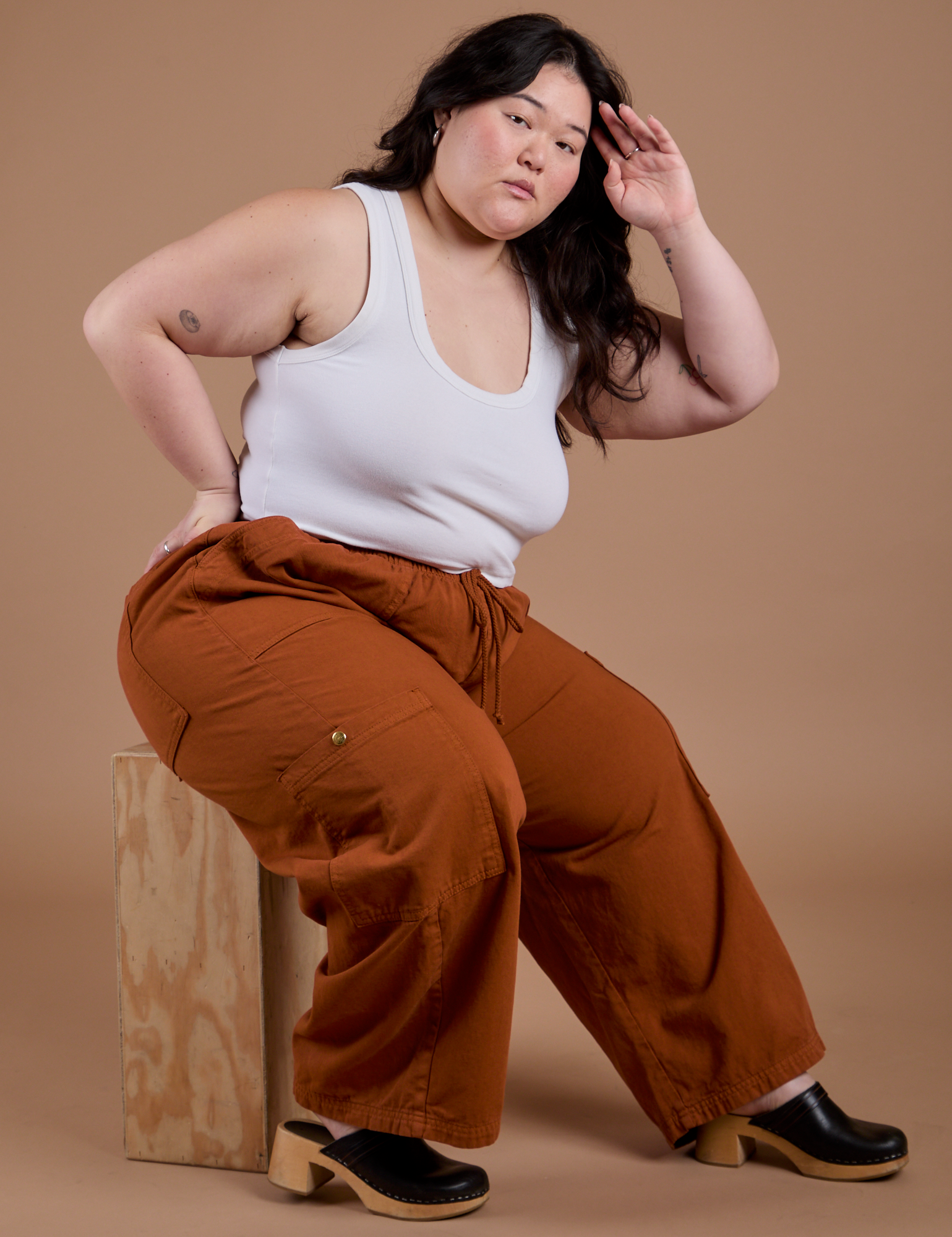 Drop Pocket Cargo Pants in Burnt Terracotta and Cropped tank in Vintage Tee White worn by Ashley