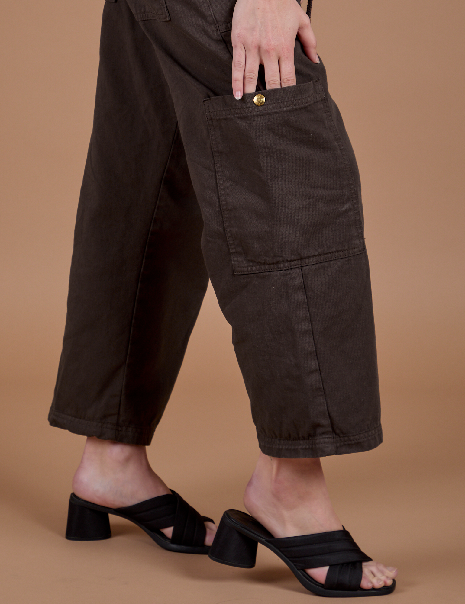 Drop Pocket Cargo Pants in Espresso Brown pant leg pocket close up on Alex