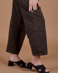Drop Pocket Cargo Pants in Espresso Brown pant leg pocket close up on Alex