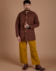 Ripstop Field Coat in Fudgesicle Brown and spicy mustard Drop Pocket Cargo Pants on Jesse