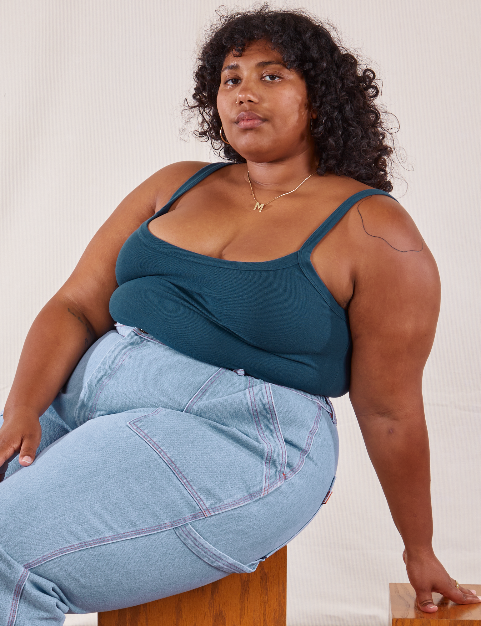 Morgan is wearing Cropped Cami in Lagoon