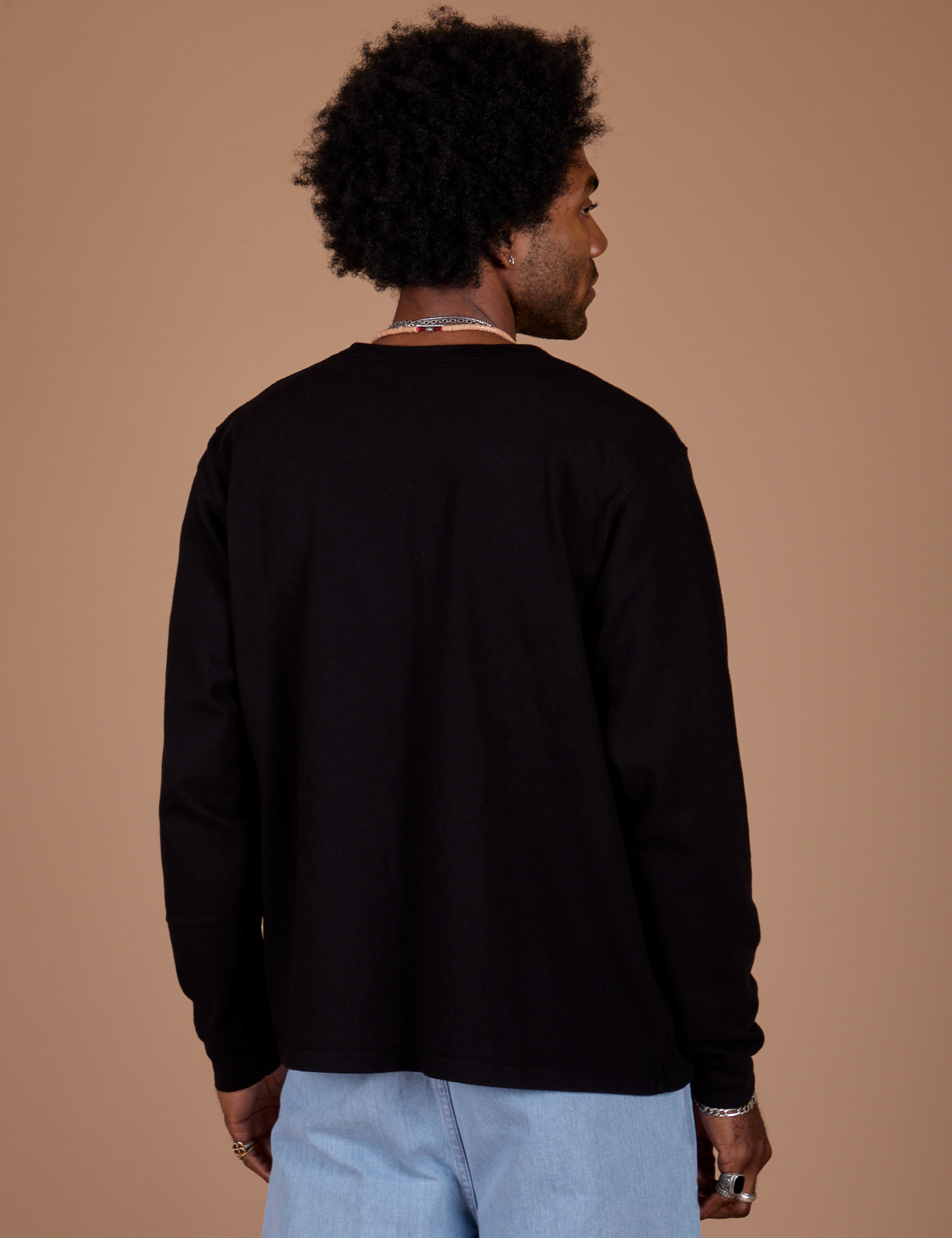 Long Sleeve Burly Tee in Basic Black back view on Jerrod