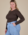 Side view of Long Sleeve Baby Tee in Espresso Brown on Lish