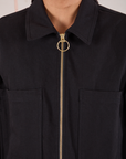 Mechanic Jacket in Basic Black front close up of brass zipper