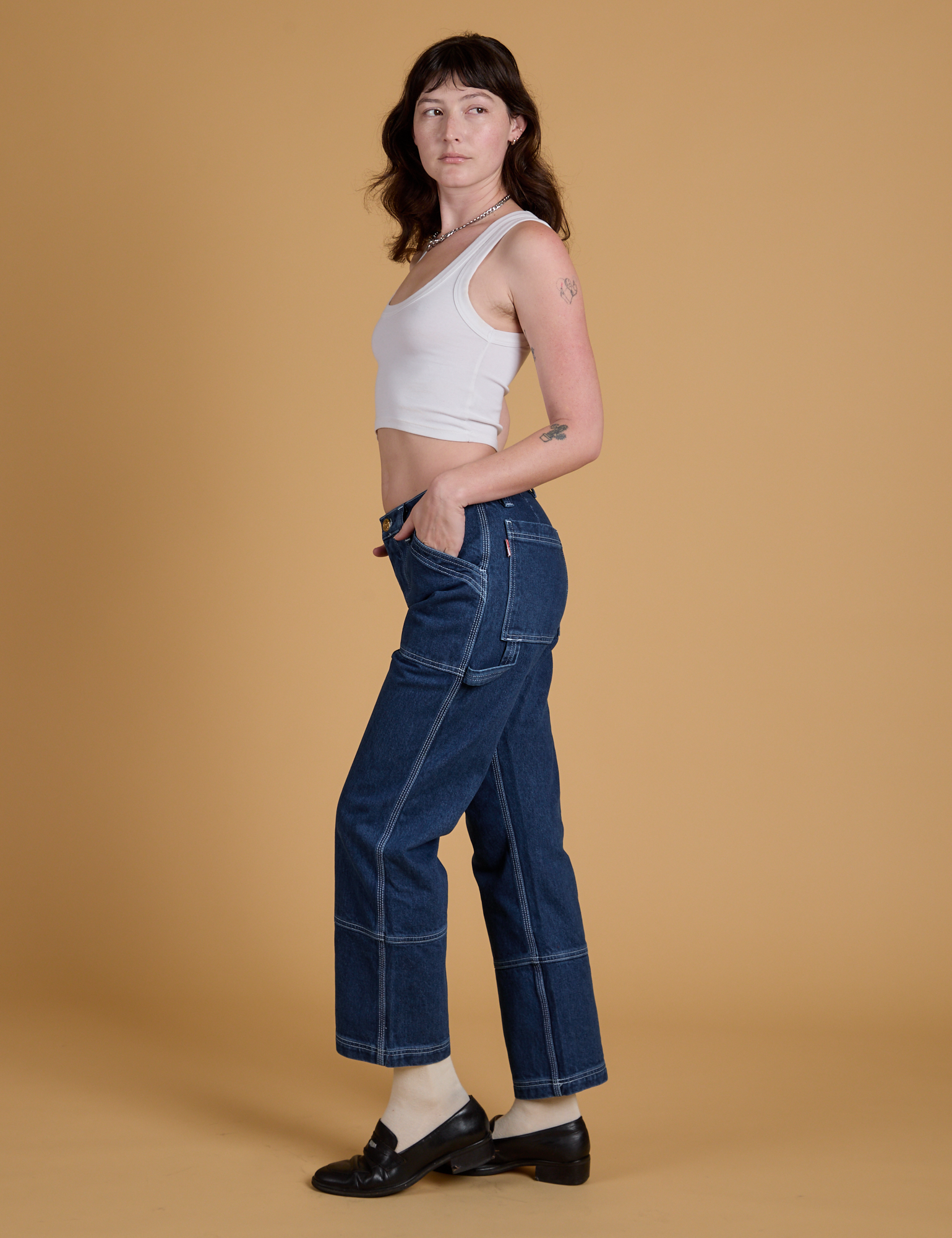 Mid-Rise Carpenter Jeans in Dark Wash and Cropped Tank in Vintage Tee White on Alex