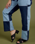 Pant leg side view close up of Mismatched Denim Carpenter Jeans on Tiara