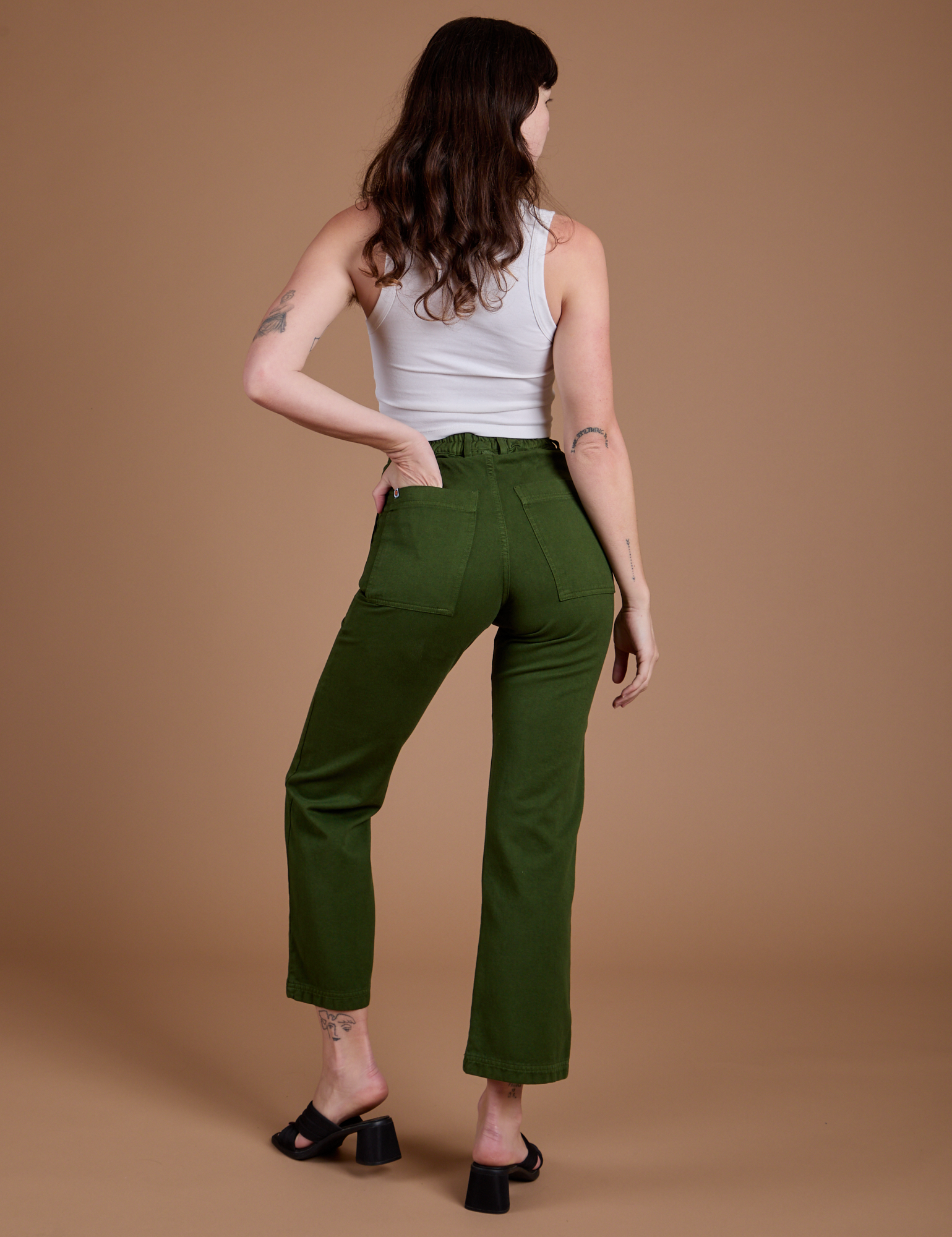 Organic Work Pants in Evergreen back view on Alex