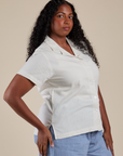 Side view of Pantry Button-Up in Vintage Tee White on Meghna