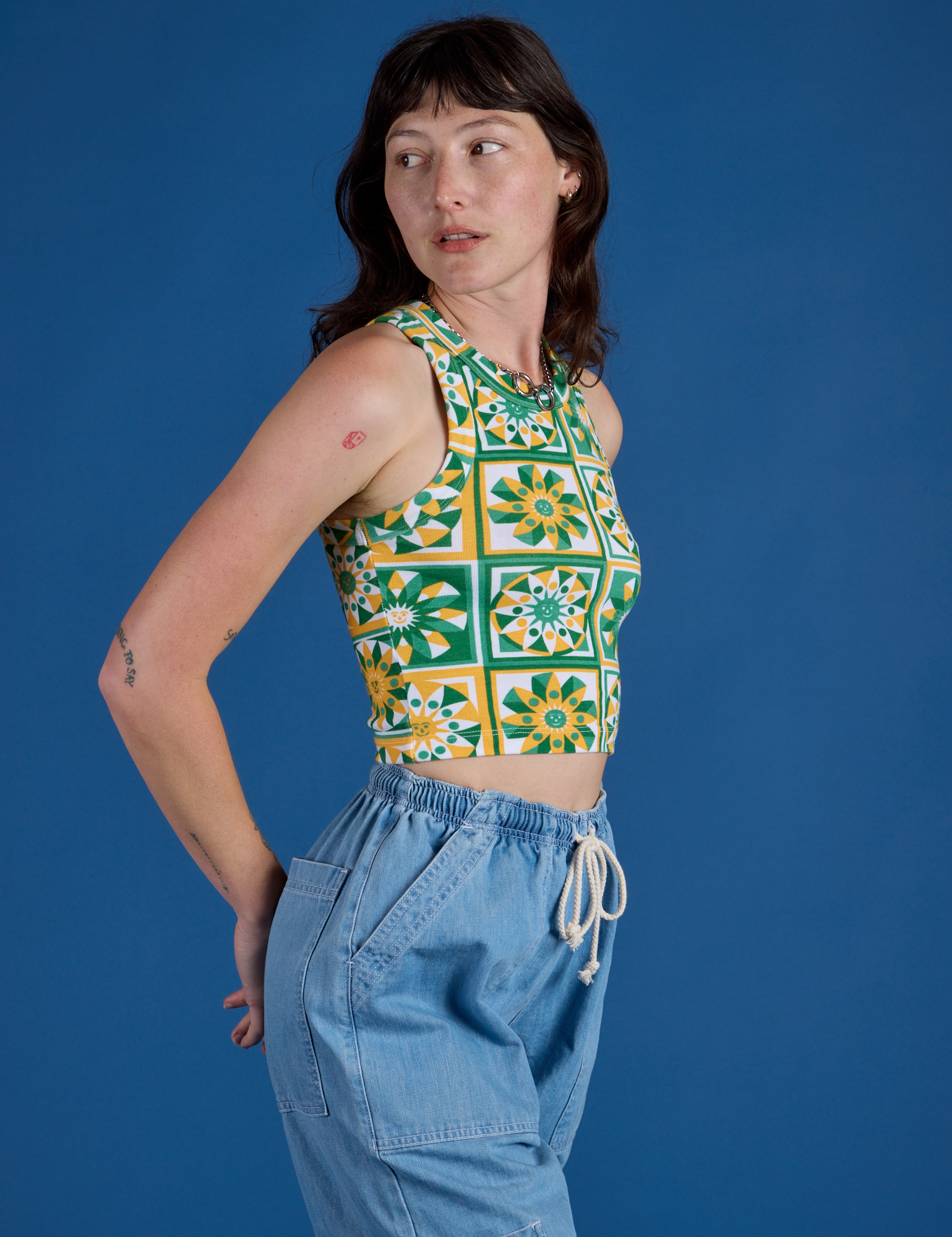 Deep-Cut Racerback Tank in Spring Quilt Print side view on Alex