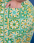 Close up of Juliet's hand in the back pocket of Drop Pocket Cargo Pants in Spring Quilt Print