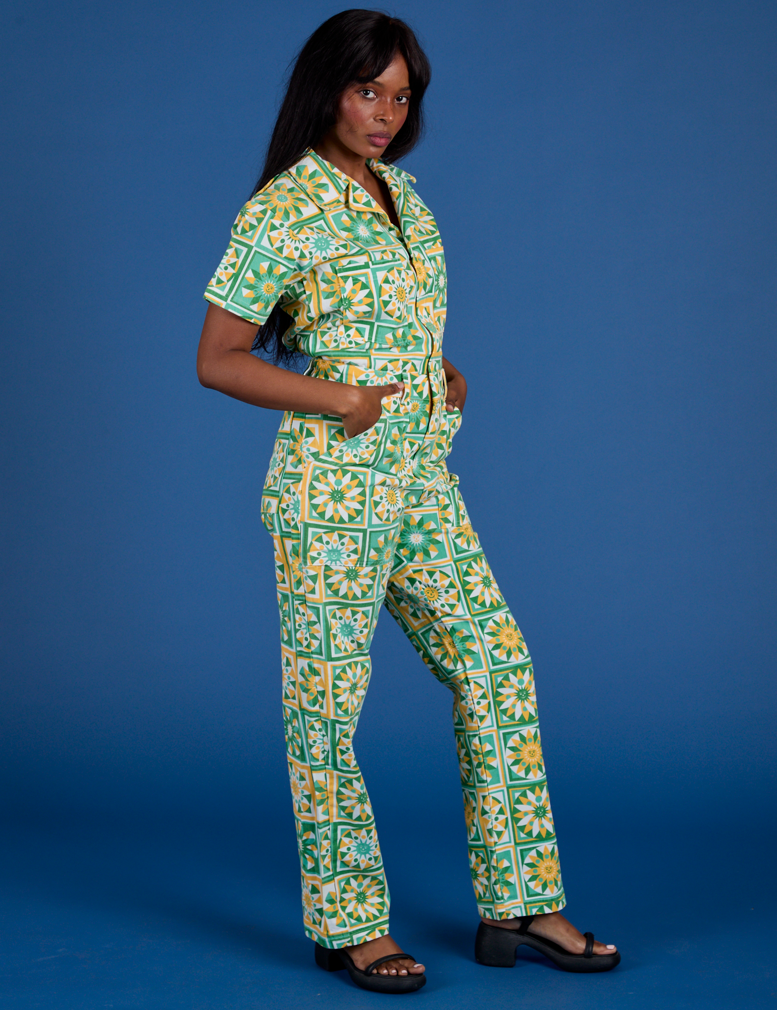 Angled front view of Spring Quilt Print Jumpsuit
