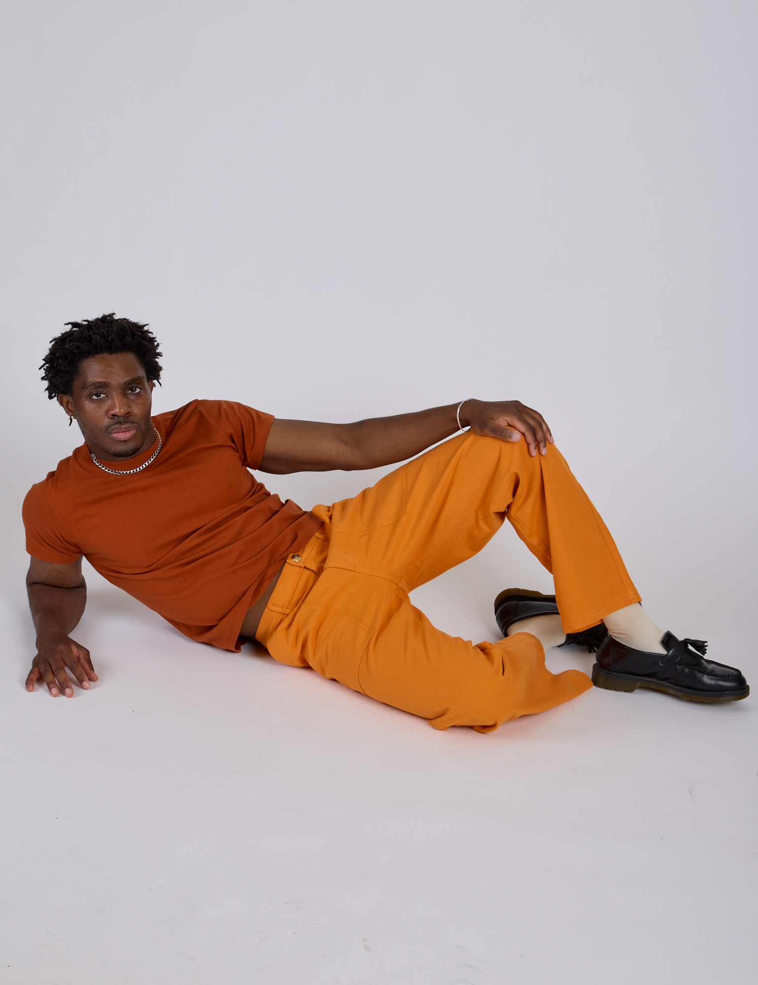 Work Pants in Creamsicle Orange and burnt terracotta Organic Vintage Tee on Isaac