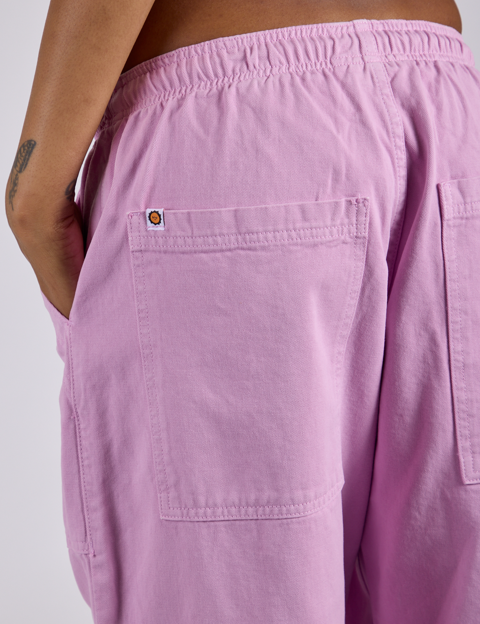Close up of Drop Pocket Cargo Pants in Lilac Purple back pocket