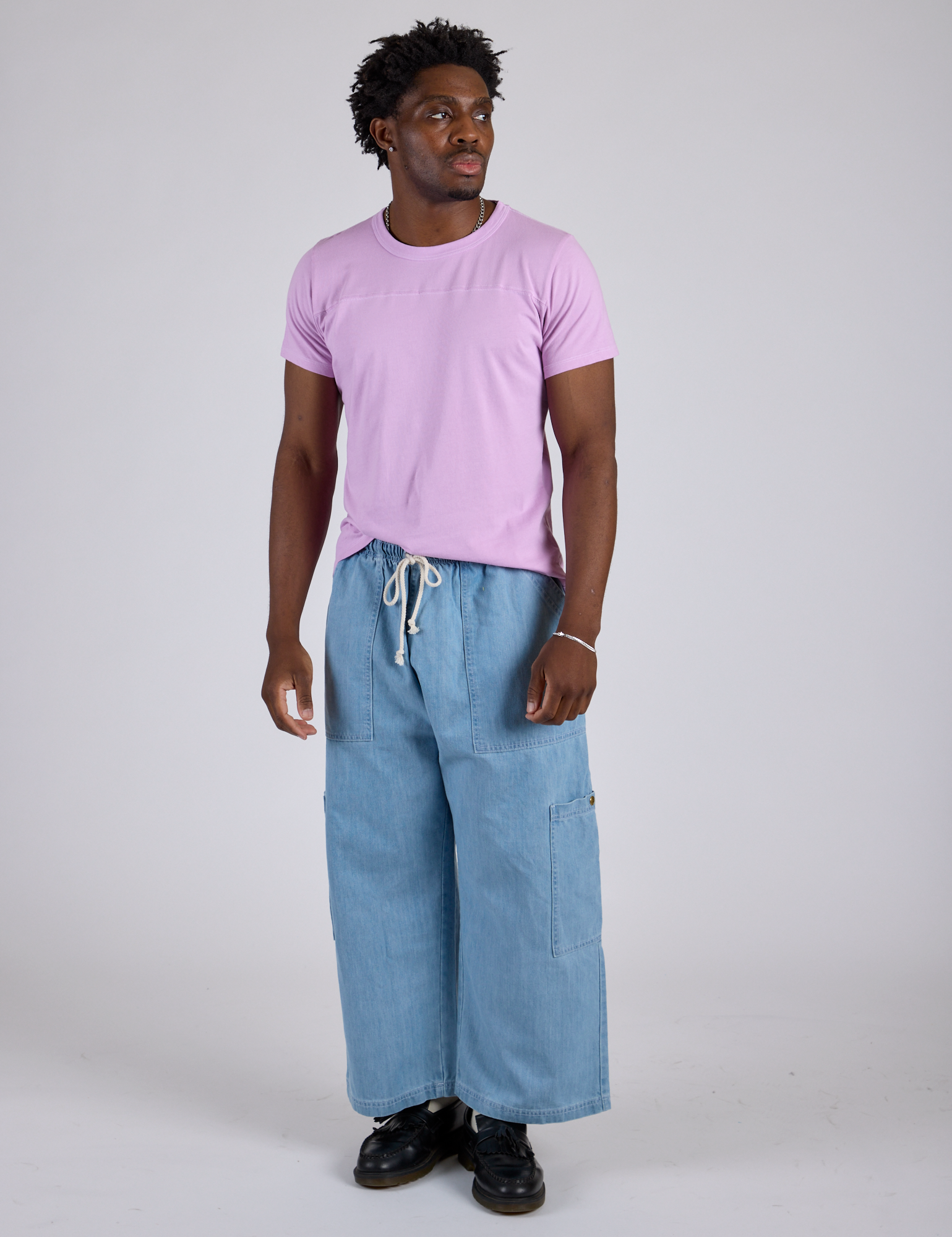 Jr. Varsity Tee in Lilac Purple and light wash Denim Drop Pocket Pants on Isaac