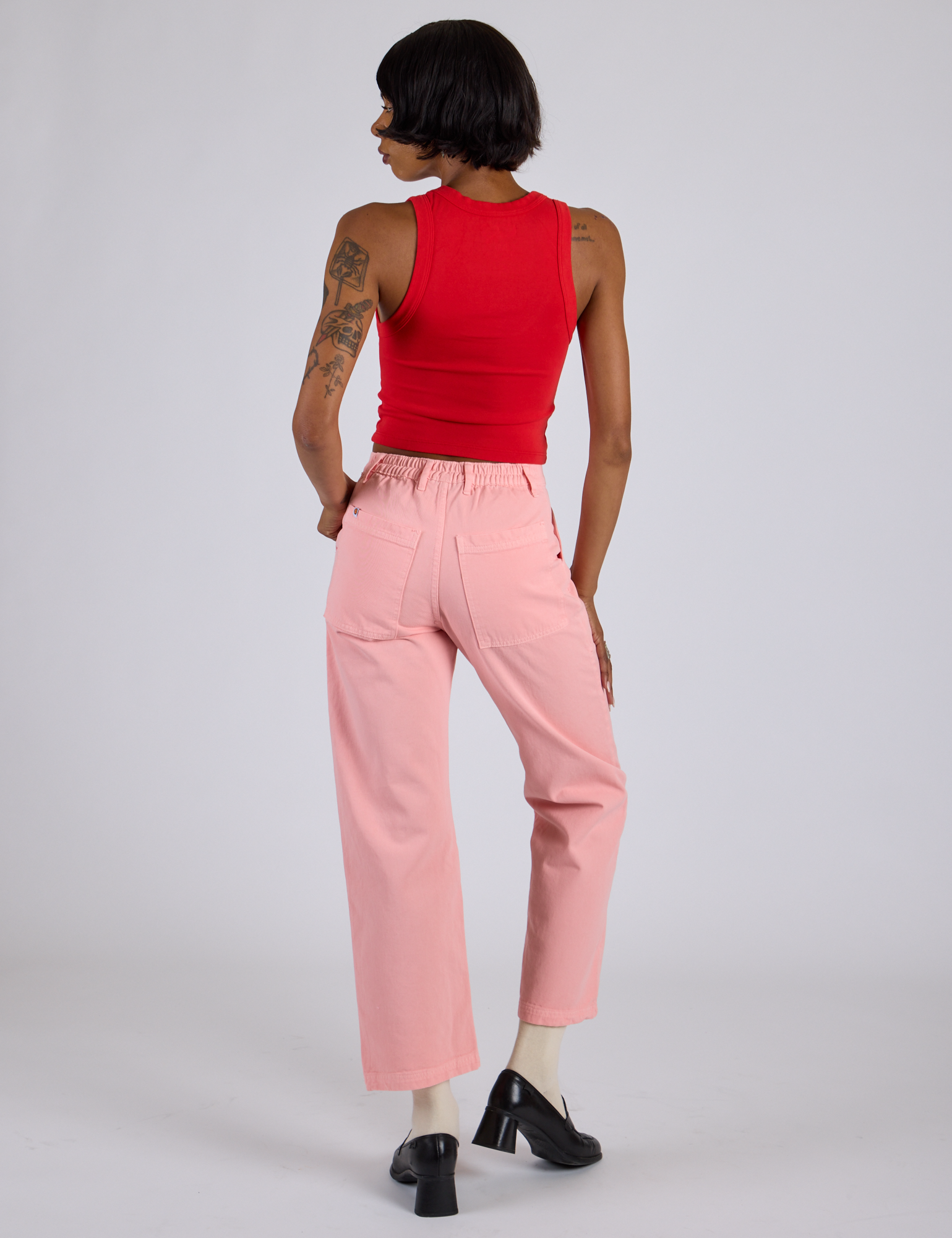 Back view of Work Pants in Baby Pink and mustang red Cropped Tank