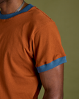 Close up of Vintage Ringer Tee in Burnt Terracotta sleeve on Jerrod