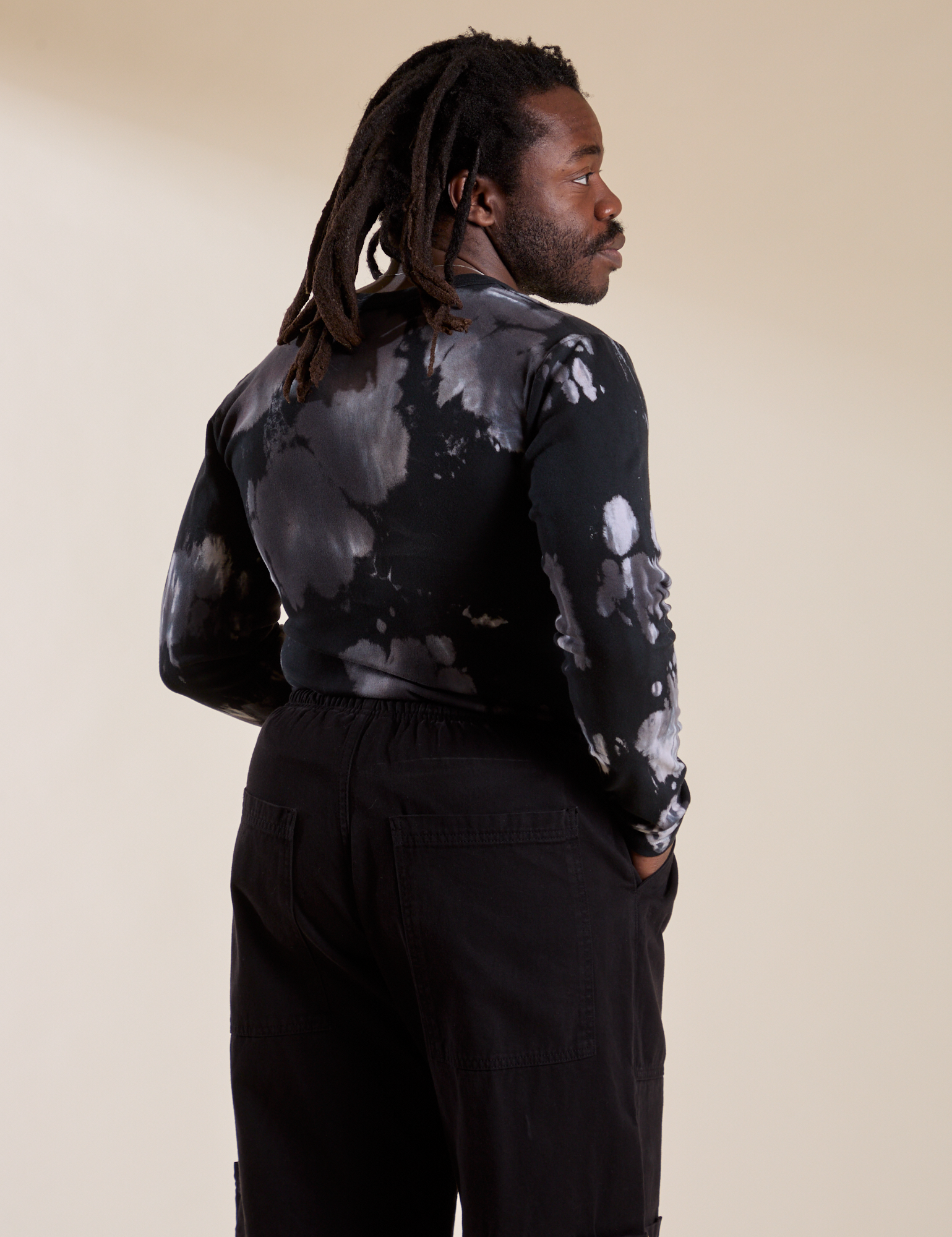 Long Sleeve Baby Tee in Ink Blot angled back view on Demi