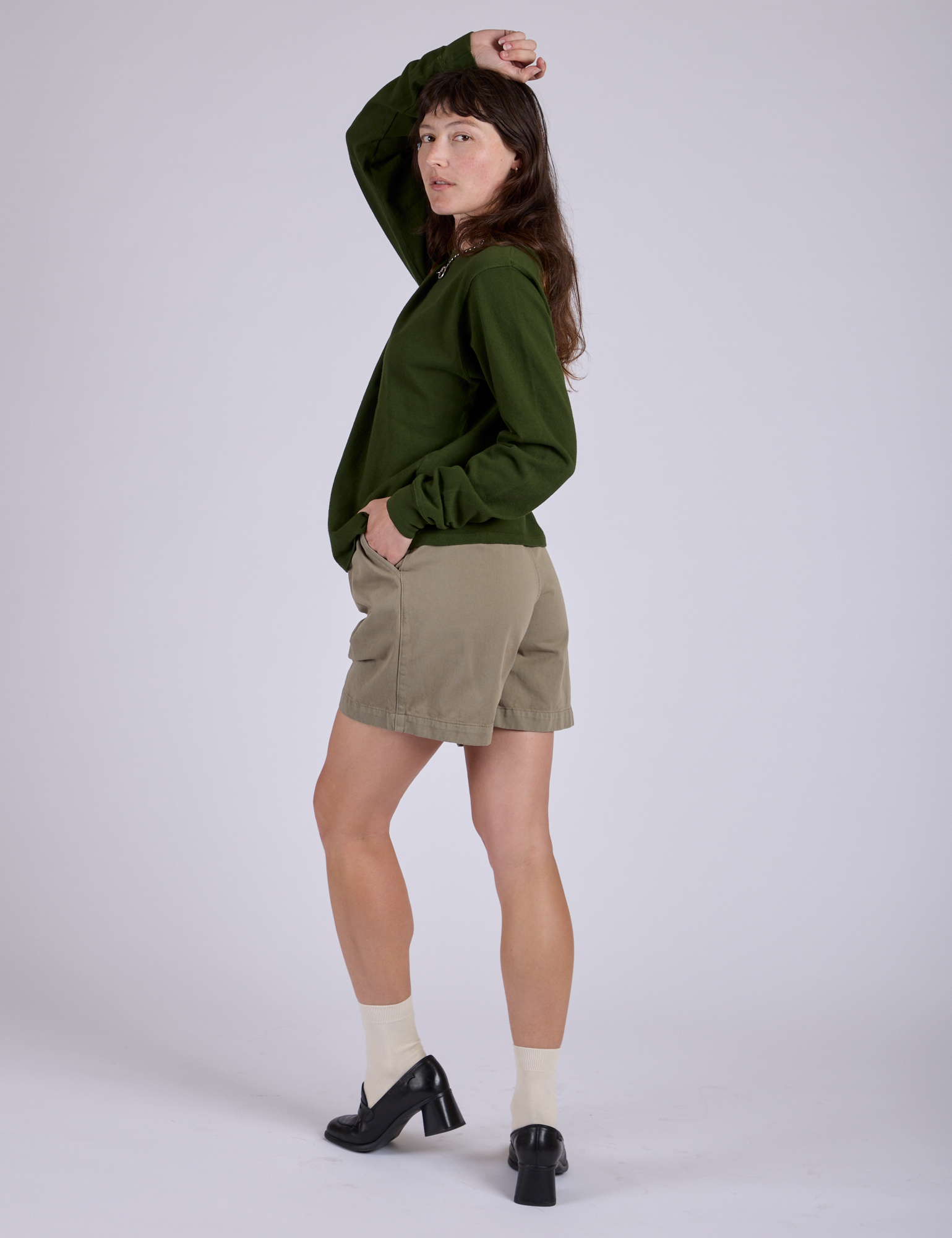 Pleated Trouser Shorts in Khaki Grey angled back view on Alex