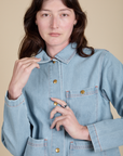Front close up of Indigo Denim Work Jacket in Light Wash on Alex