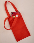 Phone tucked into mustang red Cell Phone Tote