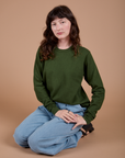 Alex is wearing Long Sleeve Burly Tee in Evergreen